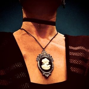 $2/15! Black and White Cameo Neclace; worn for years but still like new!